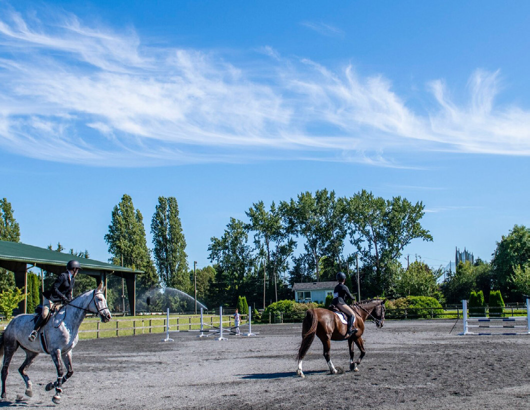 Equestrian riders at a nearby riding facility showcasing the area's equestrian lifestyle